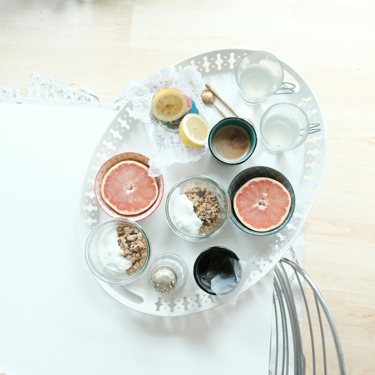 white ceramic bowl on white ceramic plate