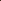 paint brushes on brown surface