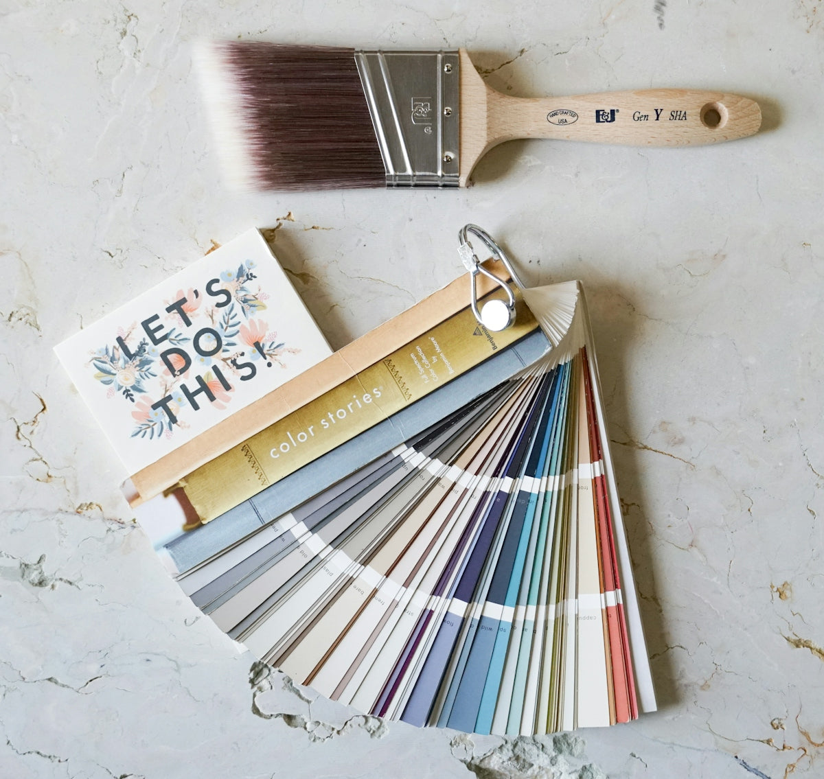 brown wooden handled brush on white surface