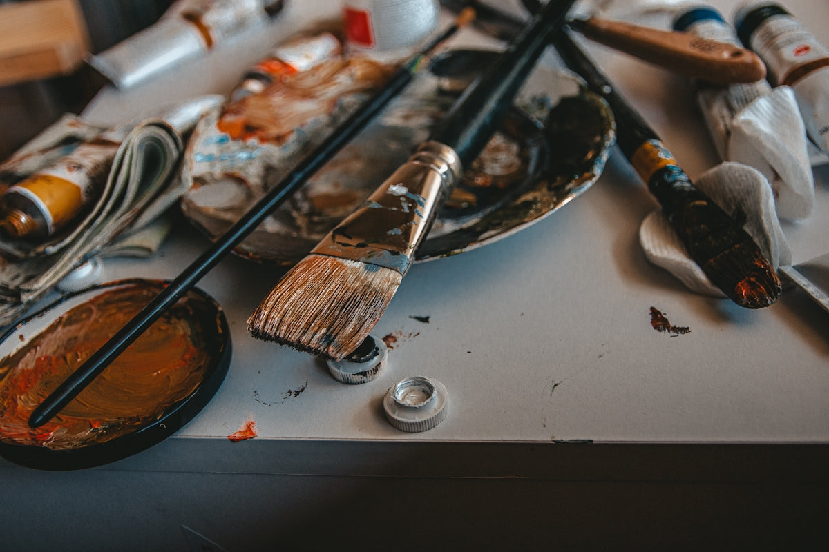brown paint brush on white table