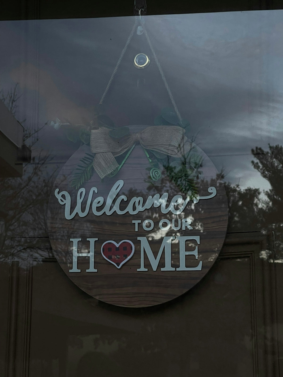 a sign that says welcome to our home